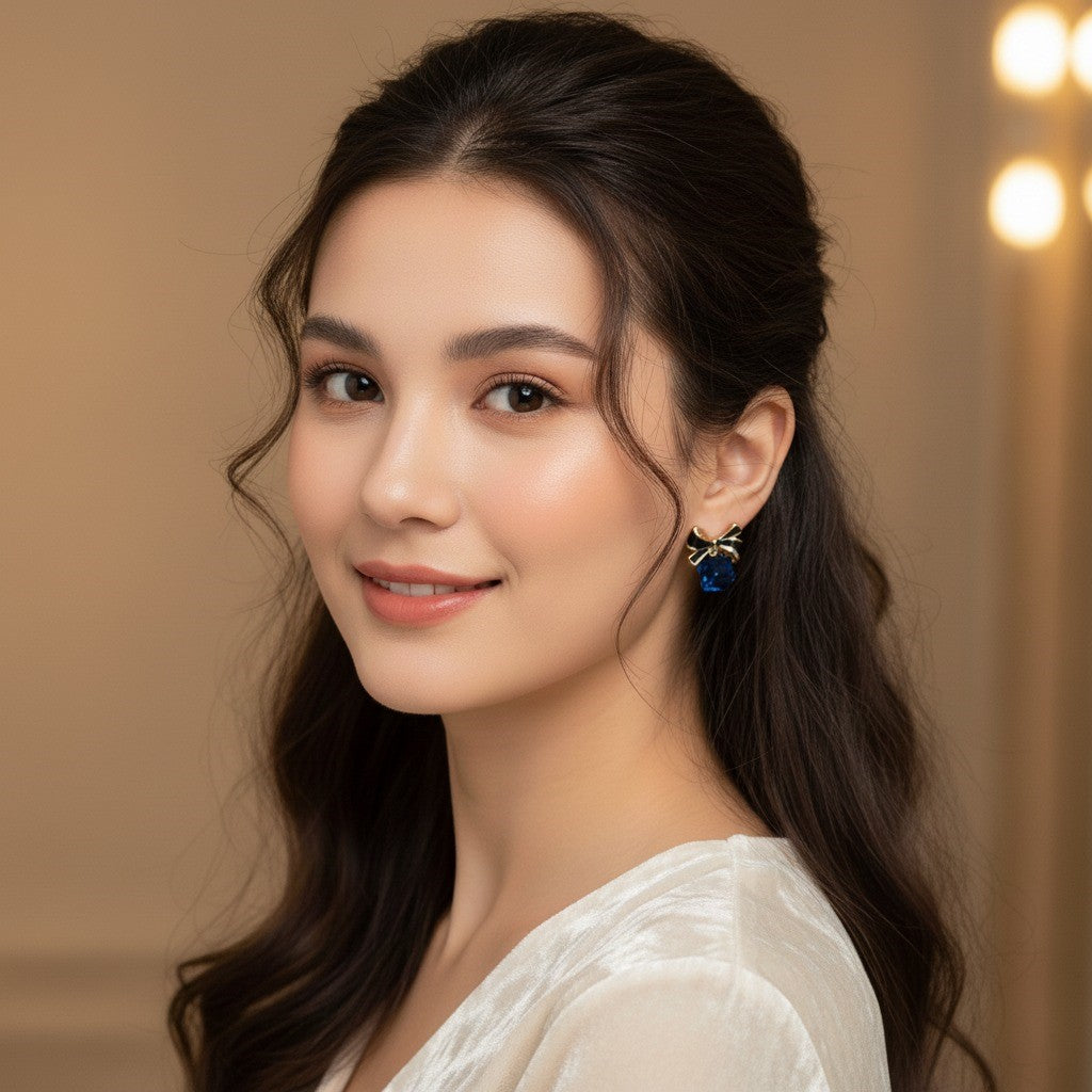 Elegant Bow & Blue Gemstone Stud Earrings – Chic Blue and Gold Accents