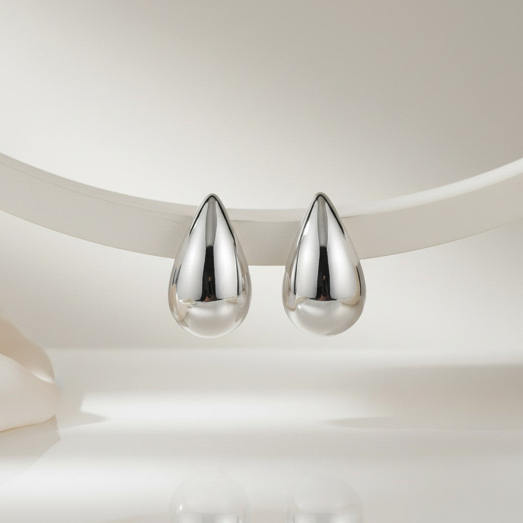 Silver Teardrop Stud Earrings – Bold Modern Minimalist Jewelry